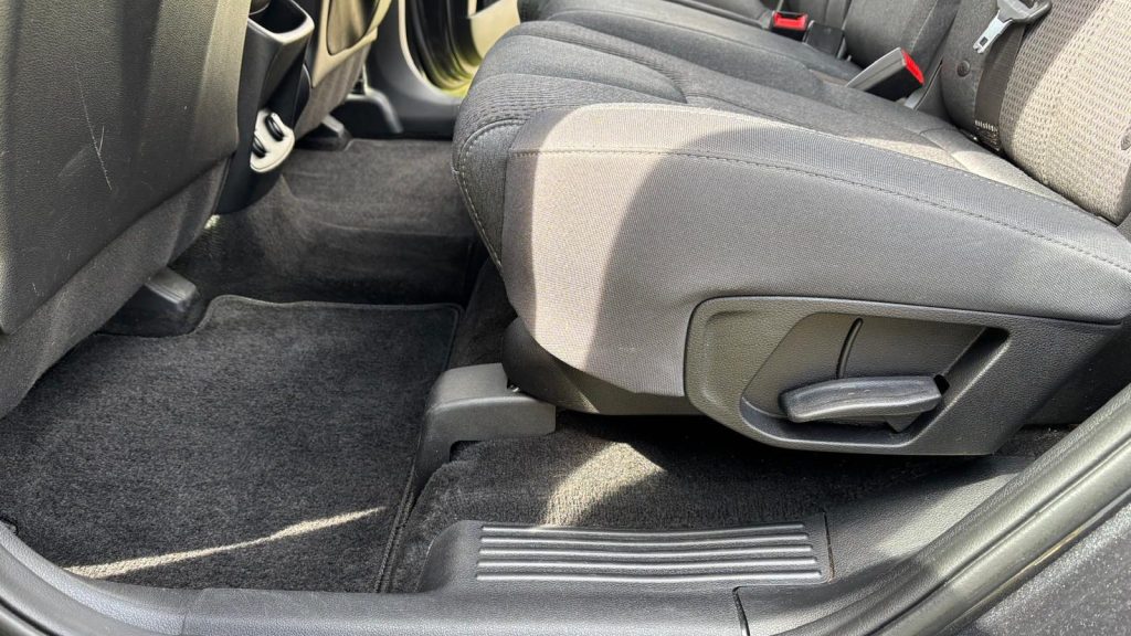 The rear seats of a car after vacuuming and carpet cleaning